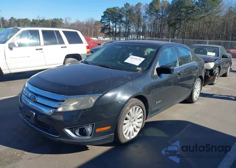 2010 Ford Fusion Hybrid из США, поврежденный, VIN 3FADP0L35AR133184